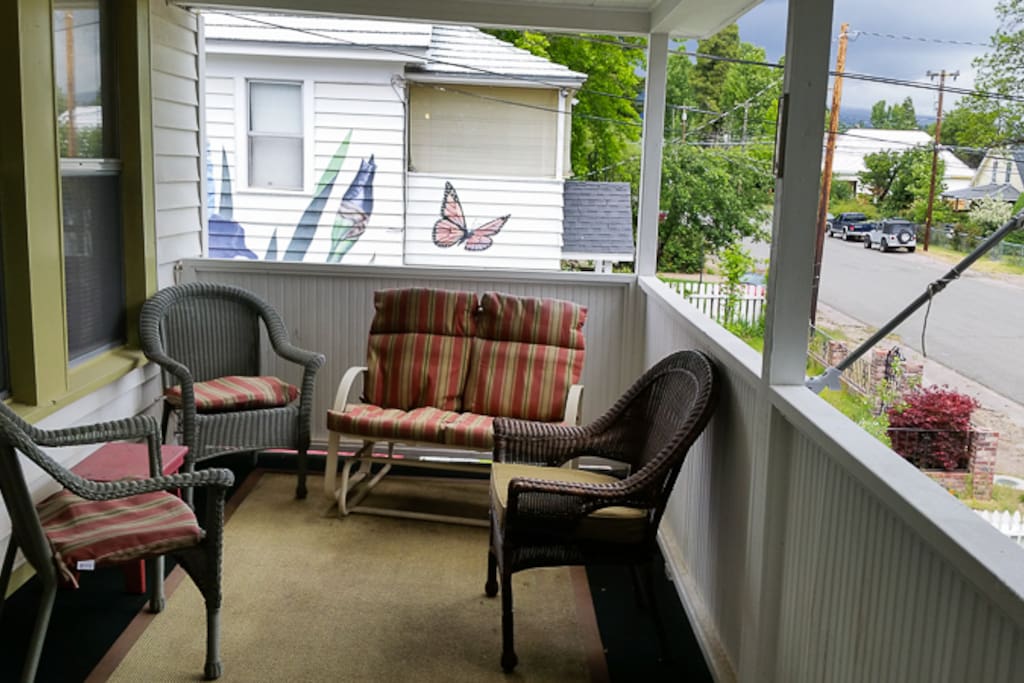 Charming front porch upstairs