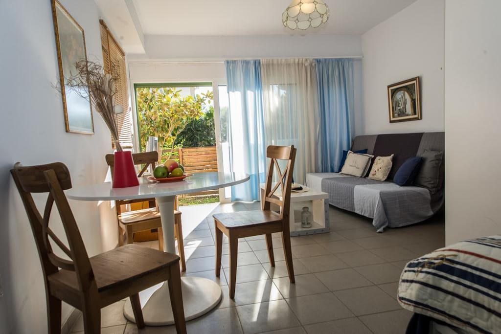 Spacious and bright living room and the way to the backyard.