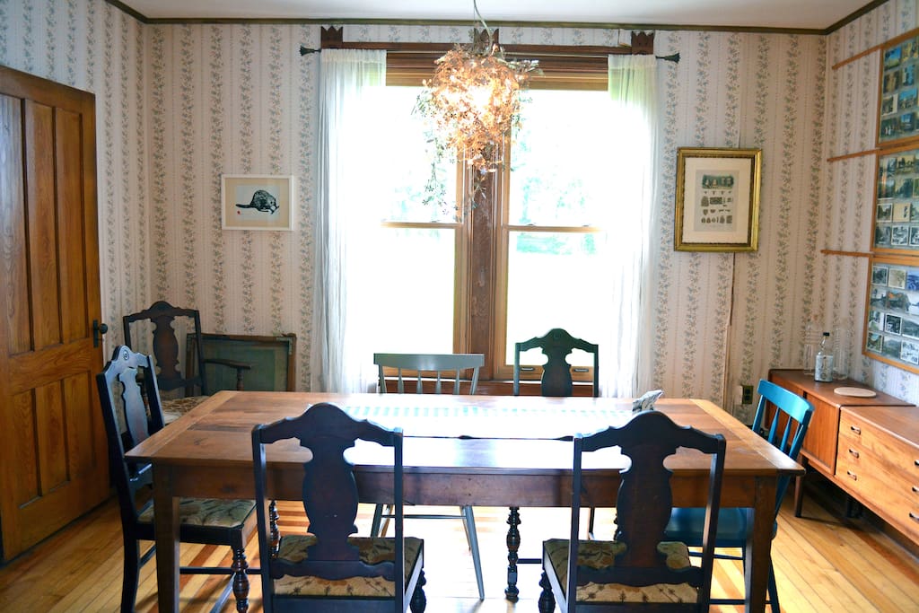 The dining room comfortably seats 6 and looks out over the lawn.