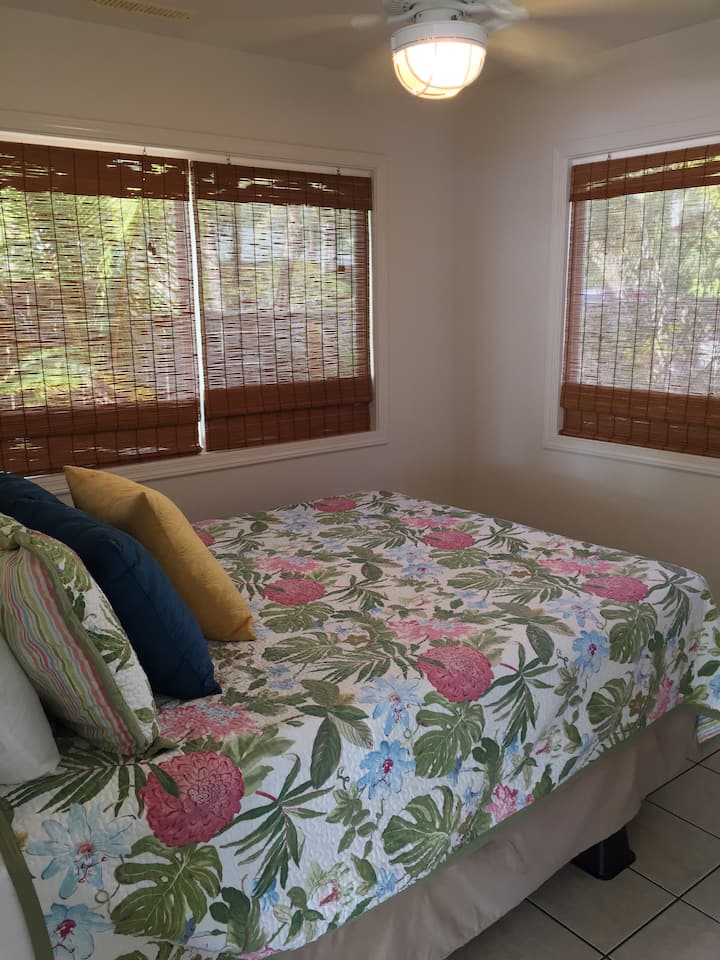 3rd Bedroom (downstairs) - The "Garden" Bedroom is the only non-ocean front room in the house yet still has ocean views from bed thru the doorway