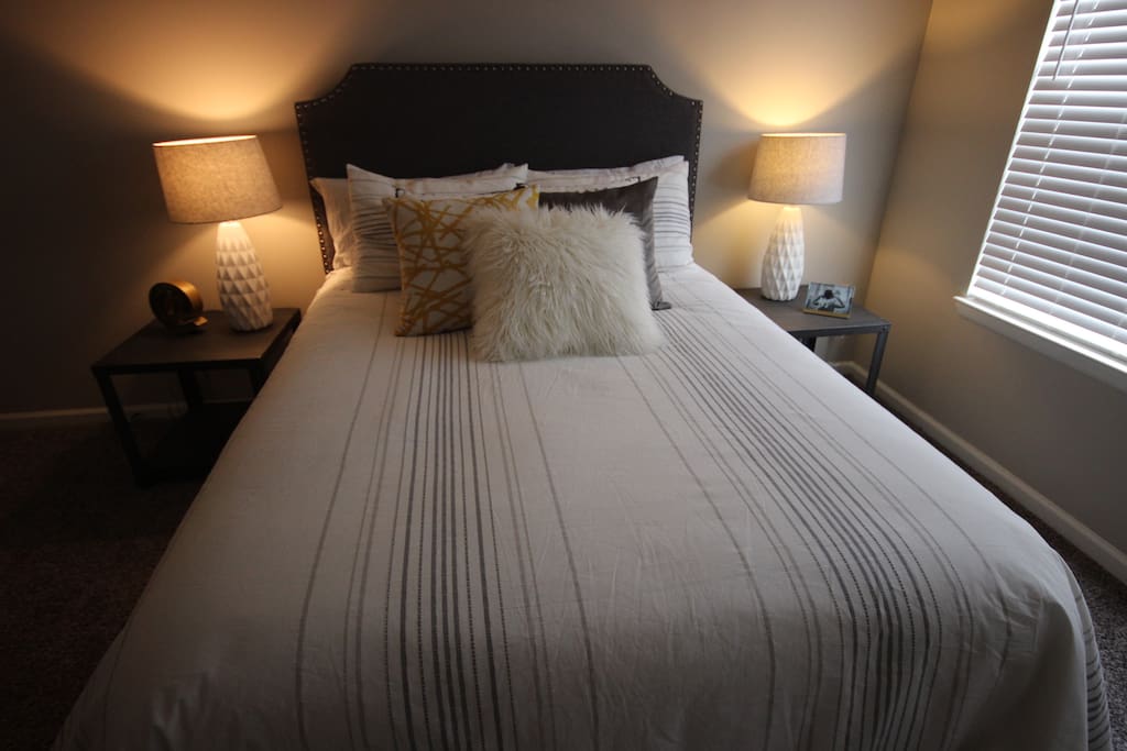 Brand New Queen size pillow-top Bed. High thread count premium bed sheets to accompany the plethora of pillows.