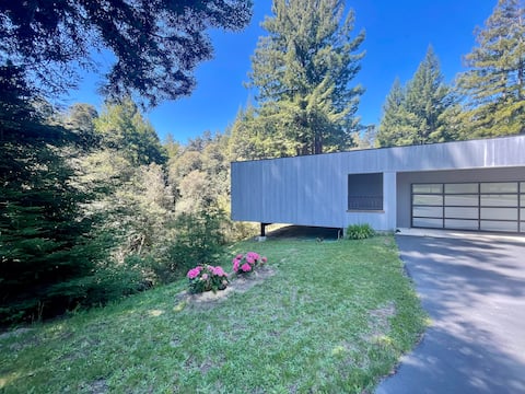 Gorgeous studio apartment in forest setting.