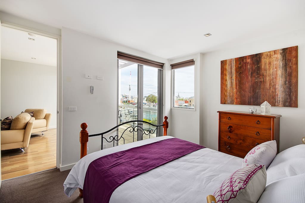 Bedroom 1 has a queen size bed and opens to the balcony. Bedroom 1 has a large wardrobe and it's own bathroom