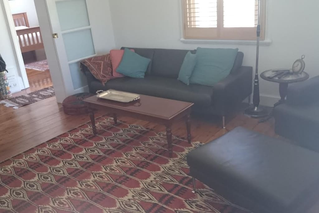 Helen's home has countless spaces to relax either inside or outside on the verandahs or in the garden.