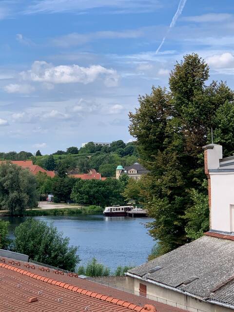 Attic apartment with water view on the island