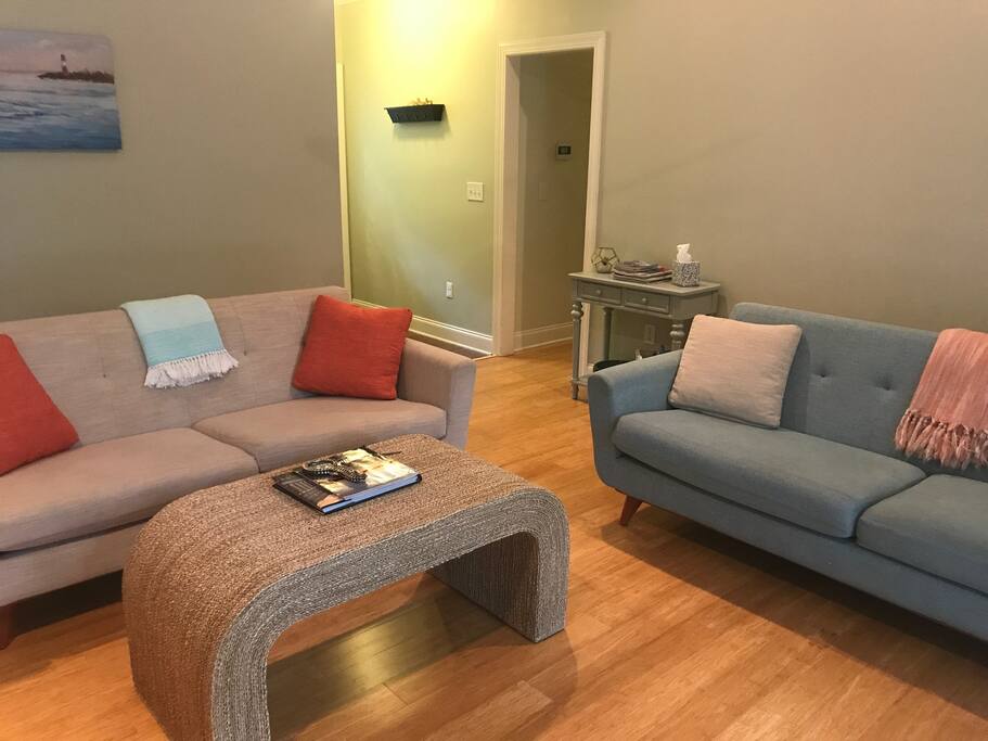 Living room from TV looking towards front entrance.