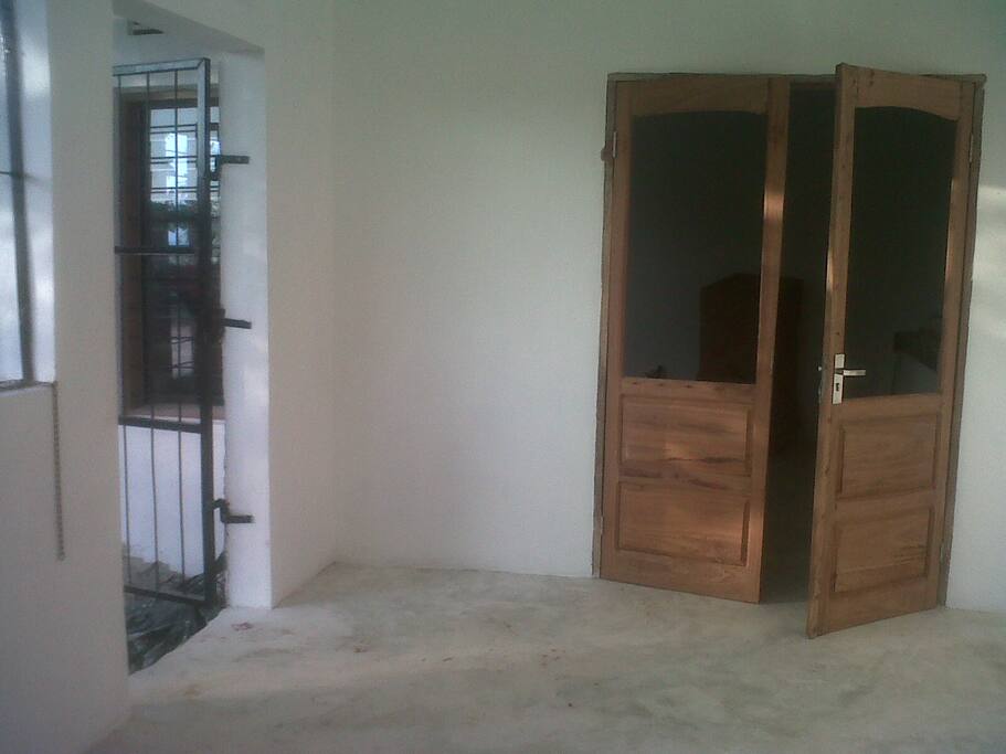 Entrance and under roof stoep