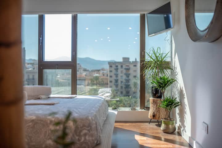 منطقة نوت بانوراميكا كون تميل إلى أوسكورانتي e تلفزيون /منطقة ليلية بانورامية مع ستائر معتِّمة وتلفزيون