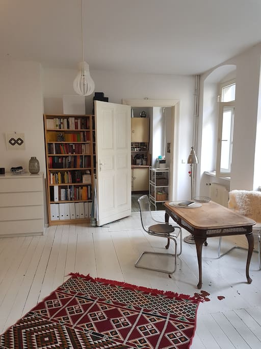 Big room with white wooden floor