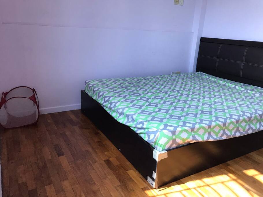 spacious, fully furnished room with queen size bed, study table, chair, wardrobe, air-conditioned
