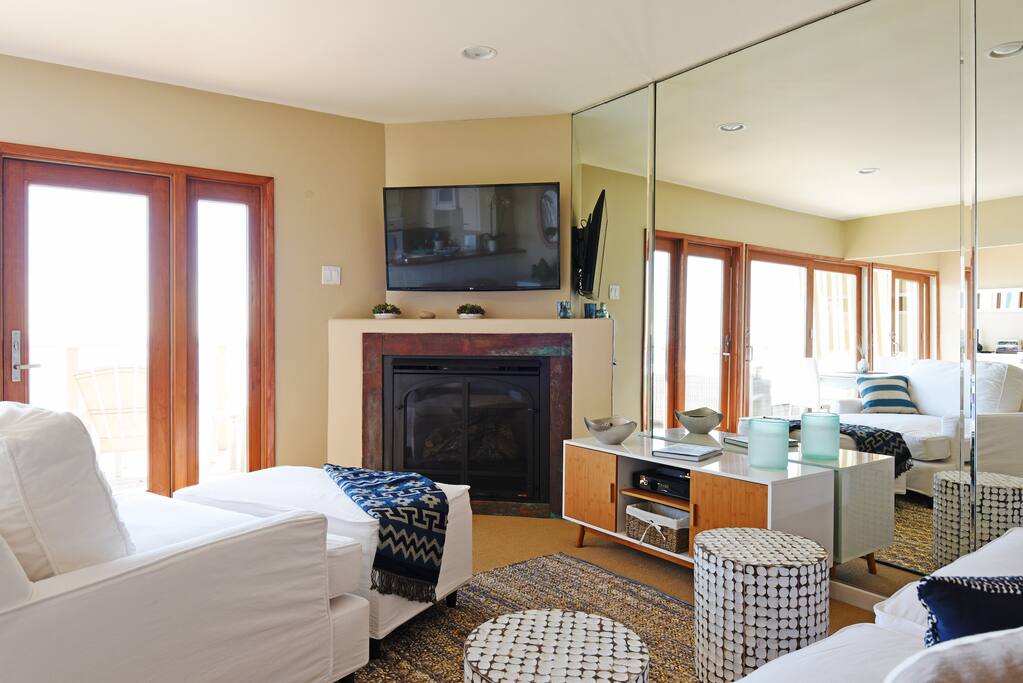 TV, fireplace, comfy denim couches, HBO, Netflix, etc.