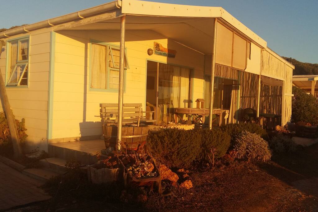 House bathed in sunset glow