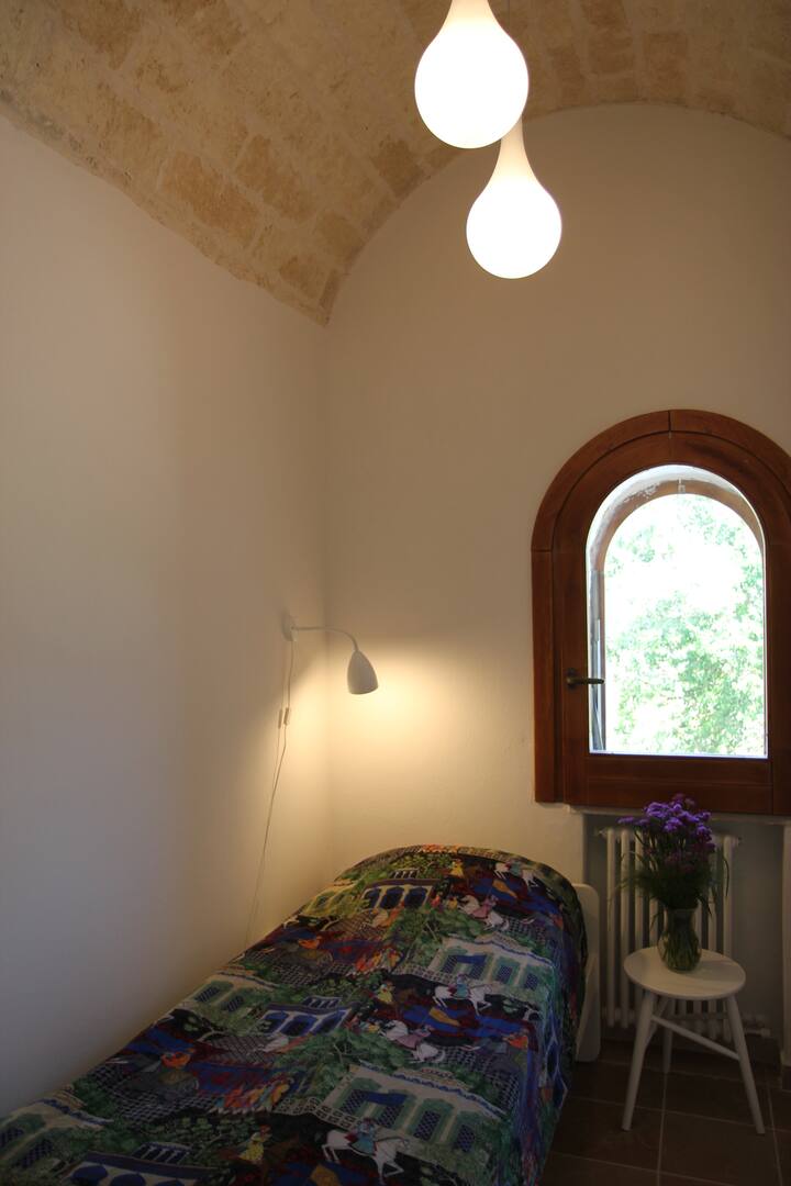 The small bedroom with a pull-out bed.