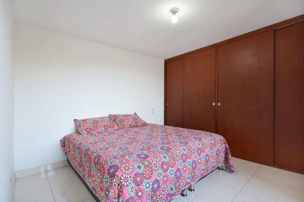 Master bedroom. King size bed.