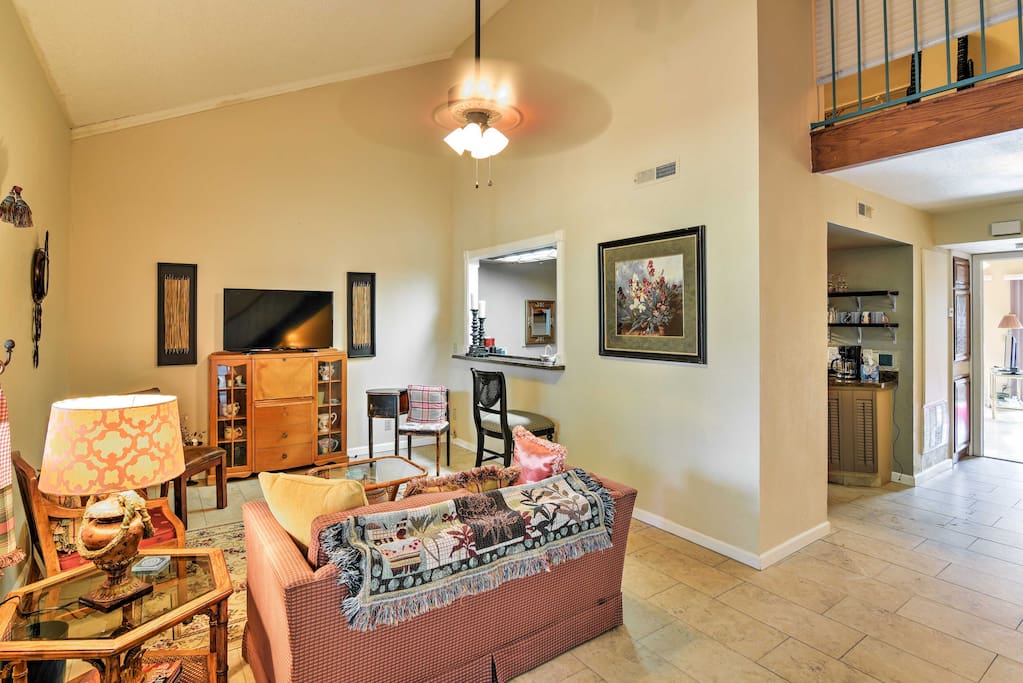 The main living area, equipped with cozy furnishings is perfect for relaxing in the company of your travel companions.