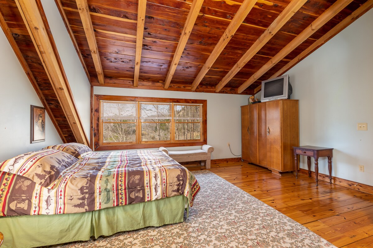 Another view of the king bed in the master bedroom