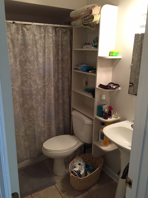 Bathroom with plenty of towels and other amenities