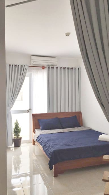 Bedroom 1 with balcony opening to the ocean