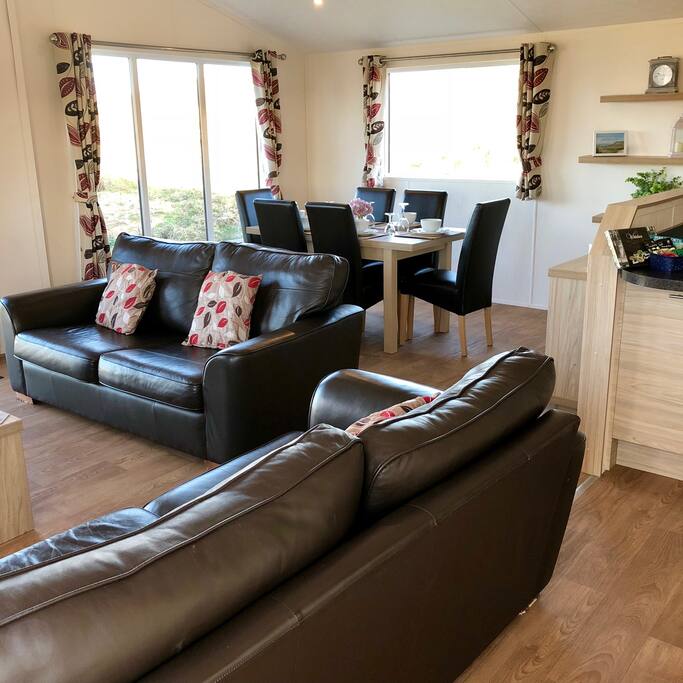 Open lounge, dining room and kitchen