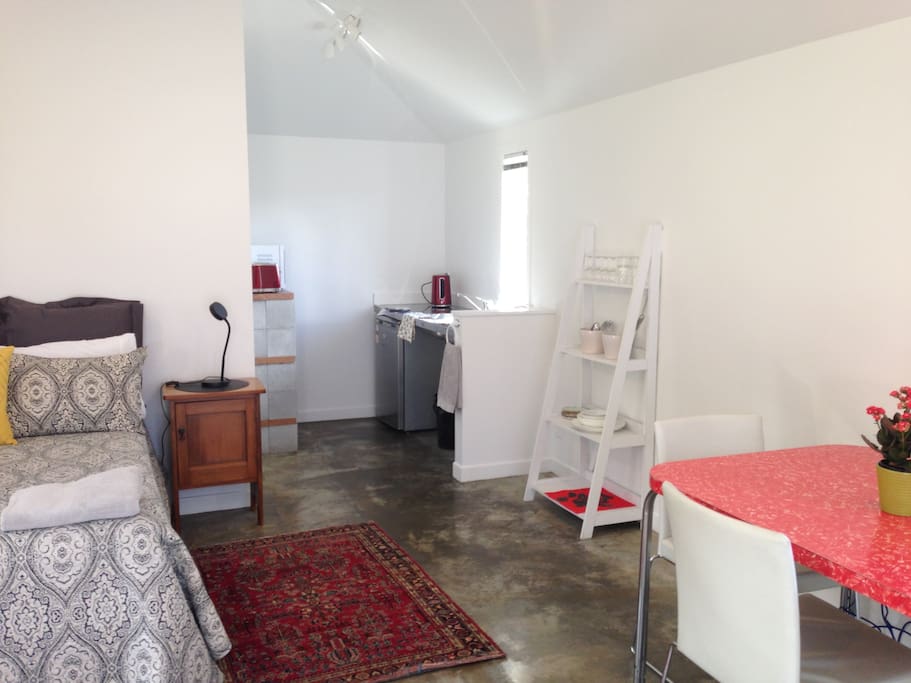 There is a kitchenette in the corner