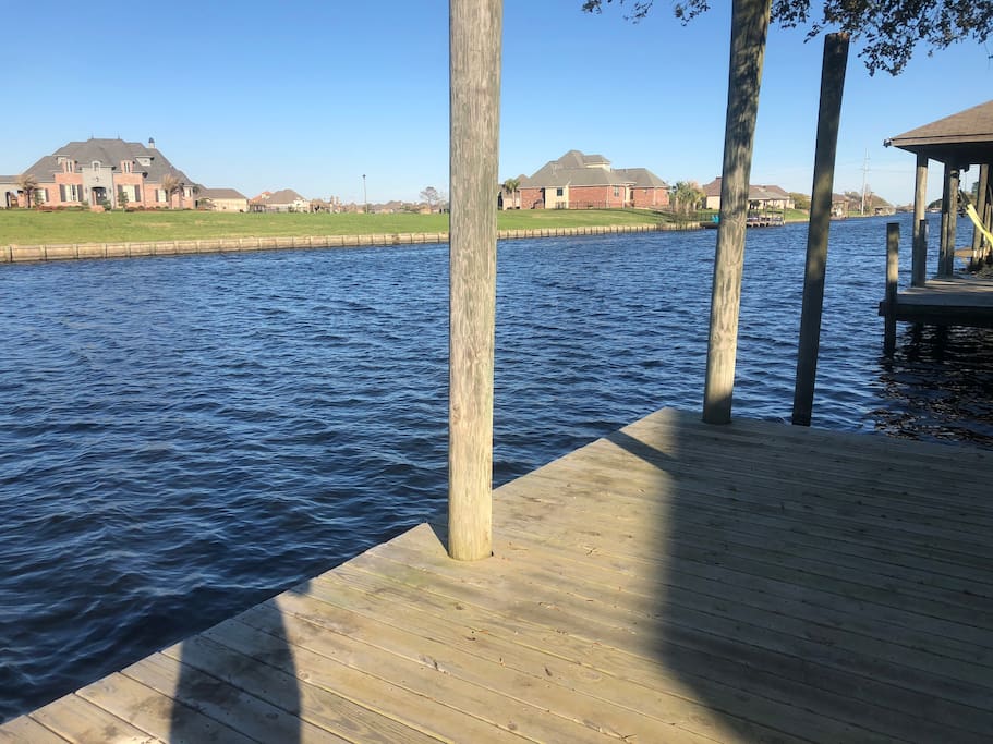 Another bayou view from the backyard dock. The water is clean enough to swim at your own risk. Renting a boat, a kayak, or jet ski and parking it in the back is always an option.