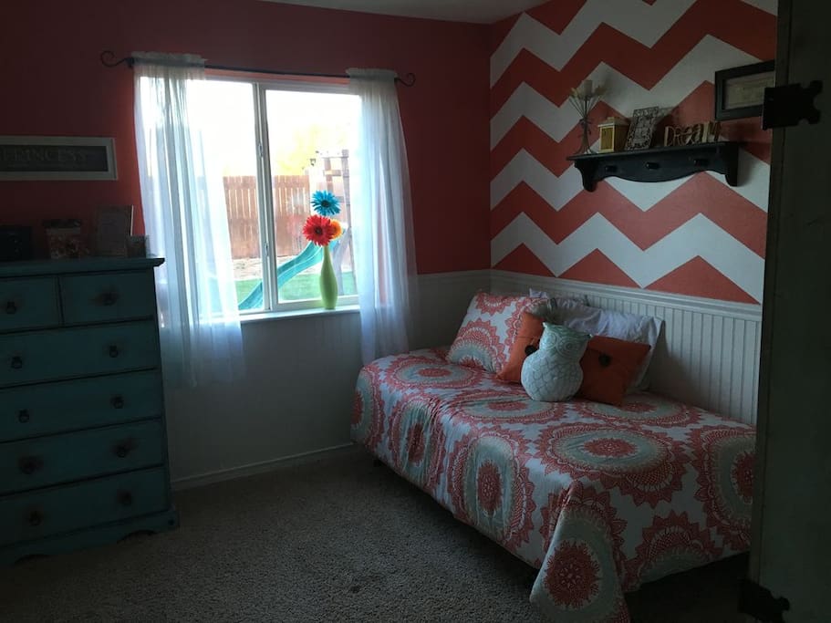 Guest bedroom with view into the back yard (the bed in this room has been upgraded to full-sized)