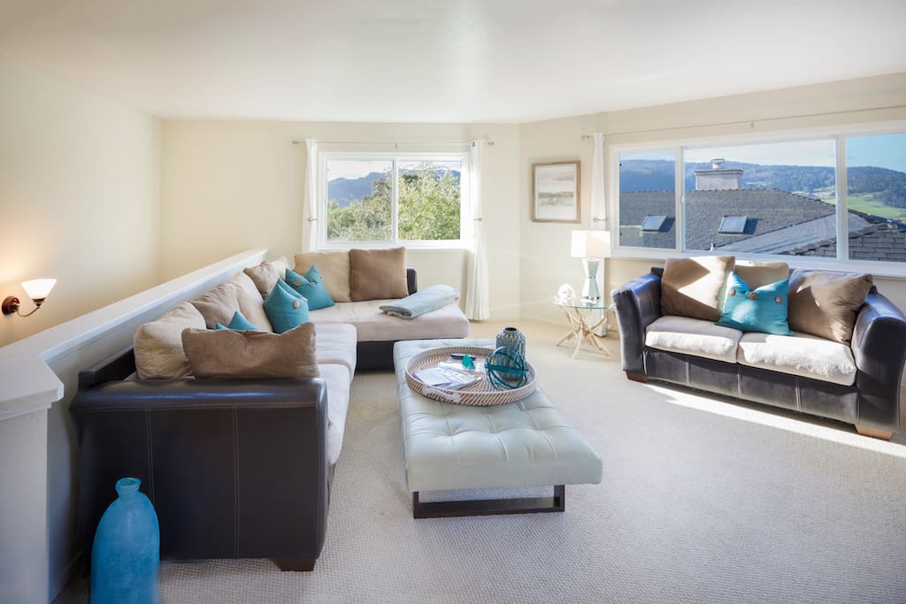 Large, cozy living area that easily seats six to spread out after a day of adventures!