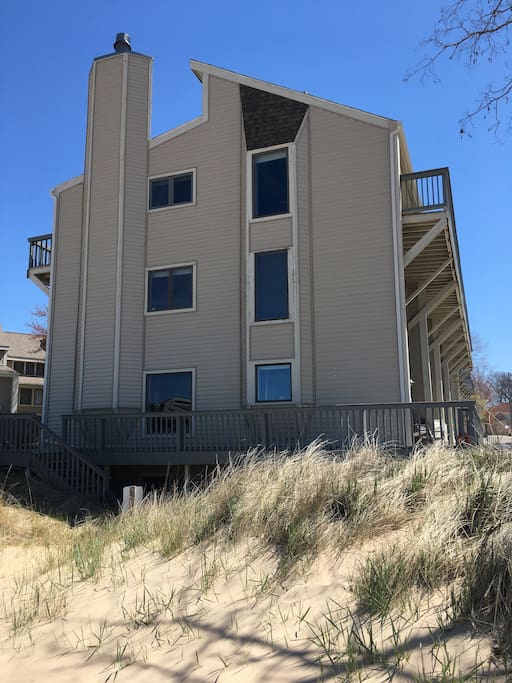 That is the unit, all 3 stories and two balconies. Every window faces the lake!