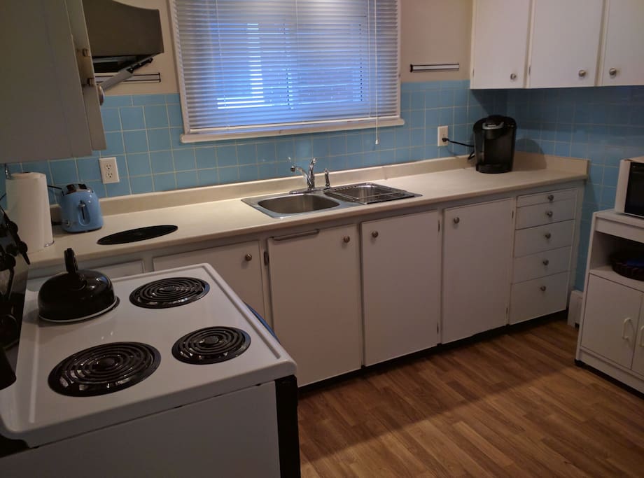 Fully equipped, clean kitchen with toaster/microwave/coffee maker .. equipped