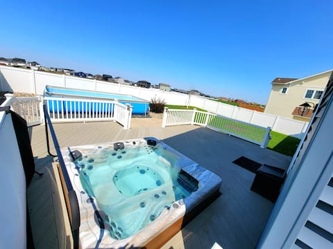 Hottub, Pool, & Gym! 
3 level home Scheels arena