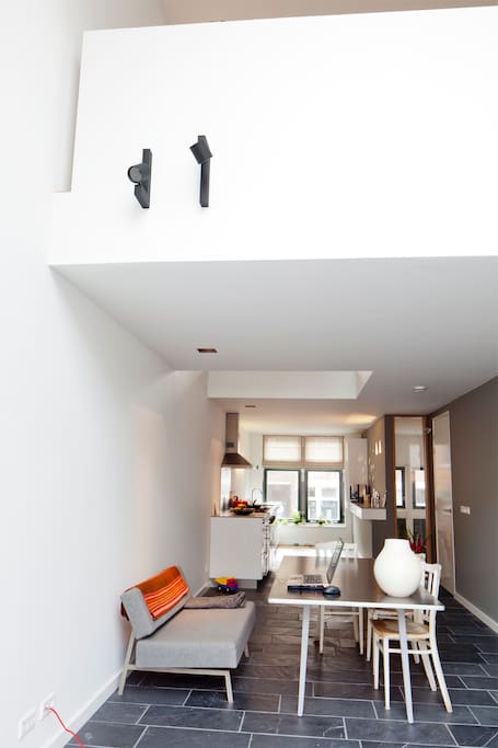 Double height windows provide ample daylight on kitchenfloor.