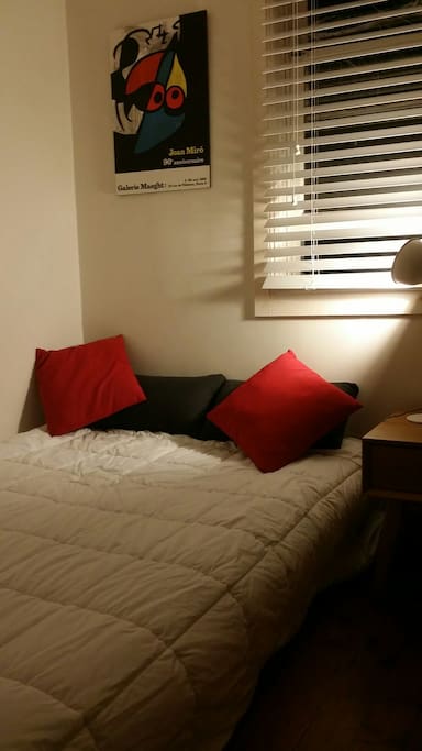 Double bed in compact room
