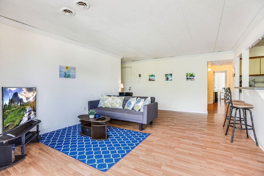 The apartment has an open layout for the dining, living room and the kitchen area. This is perfect for a more spontaneous flow of activity and interaction with friends and family members