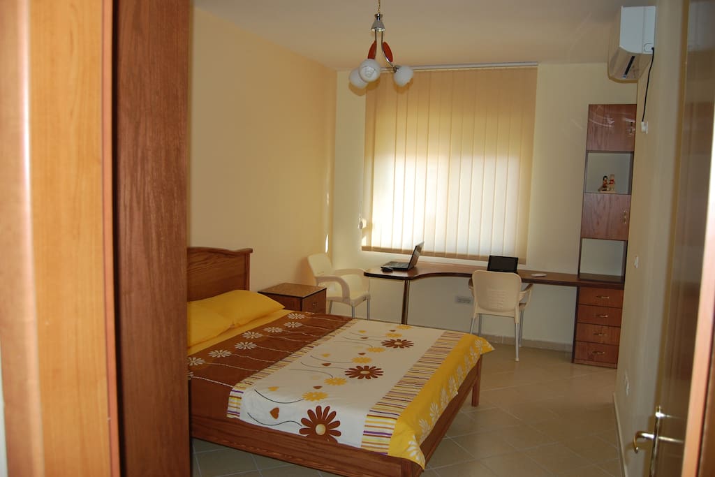 Bedroom with working area.
