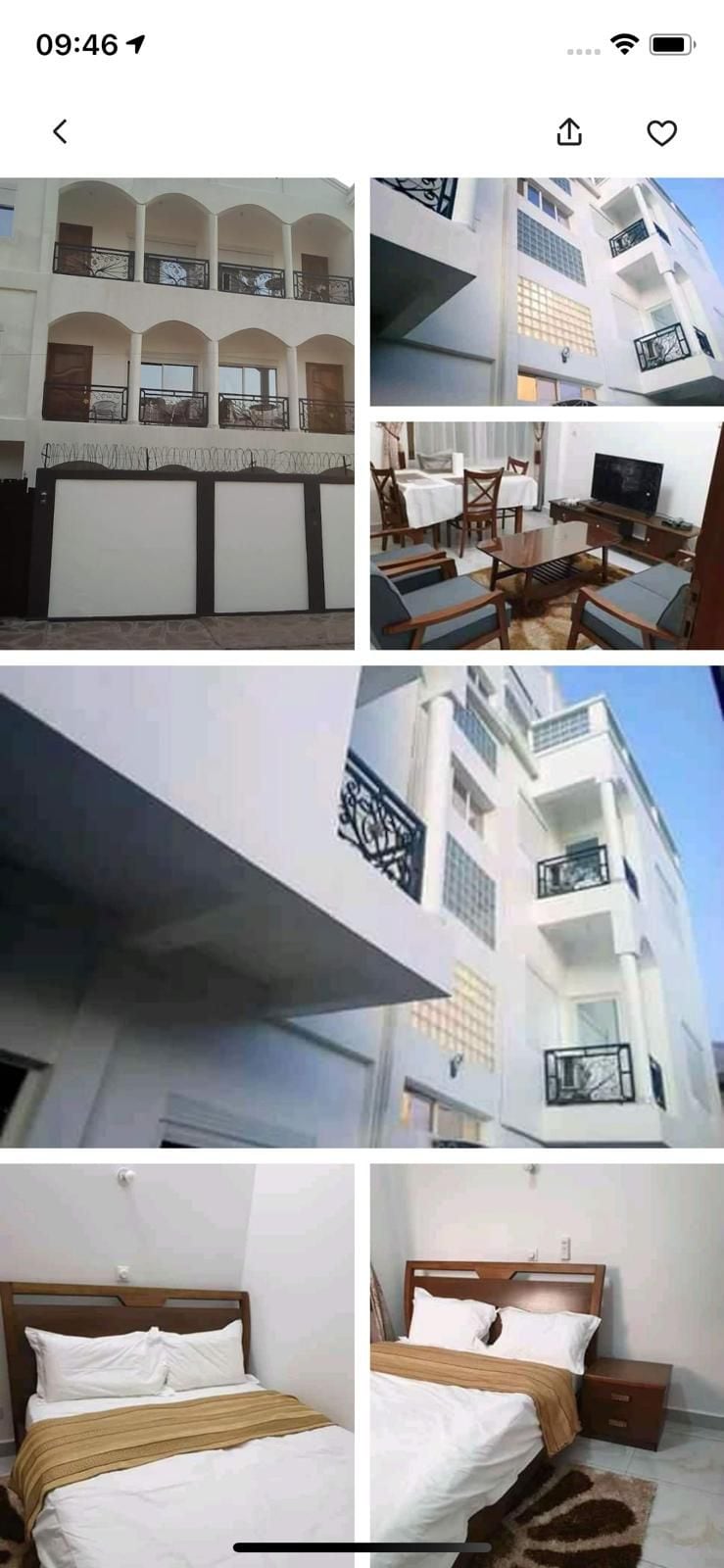 The image shows a modern building with a sleek facade featuring multiple balconies and large windows. Inside, a dining area with wooden furniture and a television is visible. A cozy sleeping area with a spacious bed is also highlighted, showcasing bright natural light.