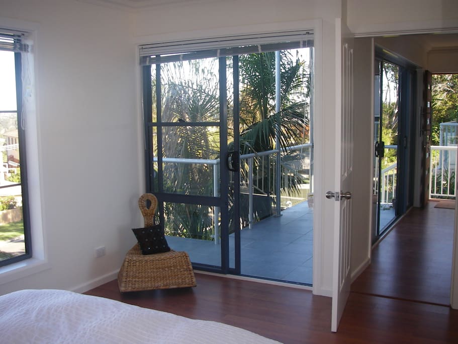 Bedroom steps out onto deck
