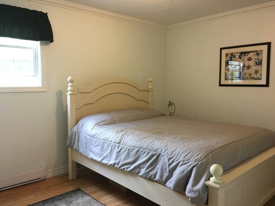 bedroom with new queen mattress