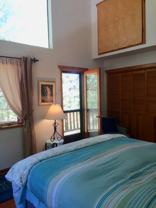 Master Bedroom with doorway to balcony with abundant sunshine