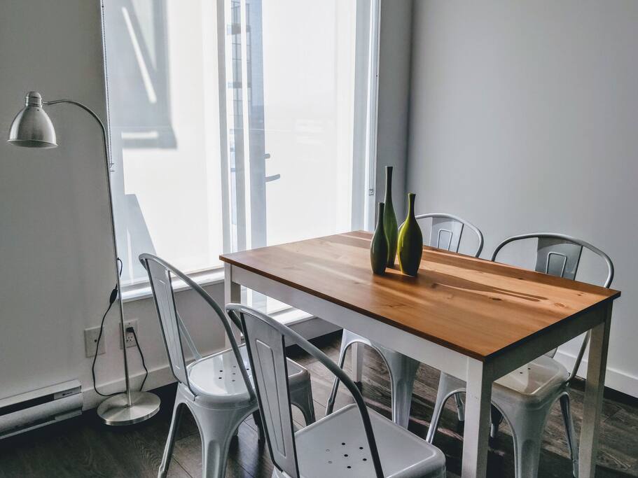 Share a meal around the table and enjoy the views outside