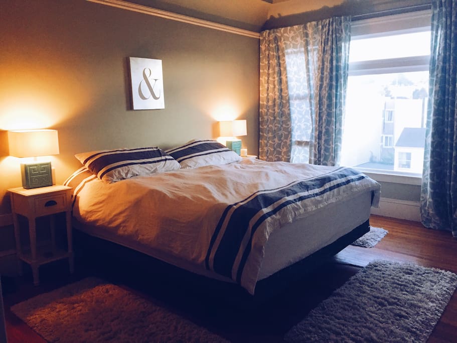 Bedroom with King Size bed, 76" x 80" (193cm x 203cm) and it's not two beds together, it's one whole luxurious mattress :)