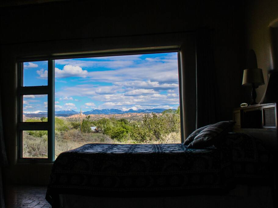 Watch the sun rise over the mountains while lying in bed
