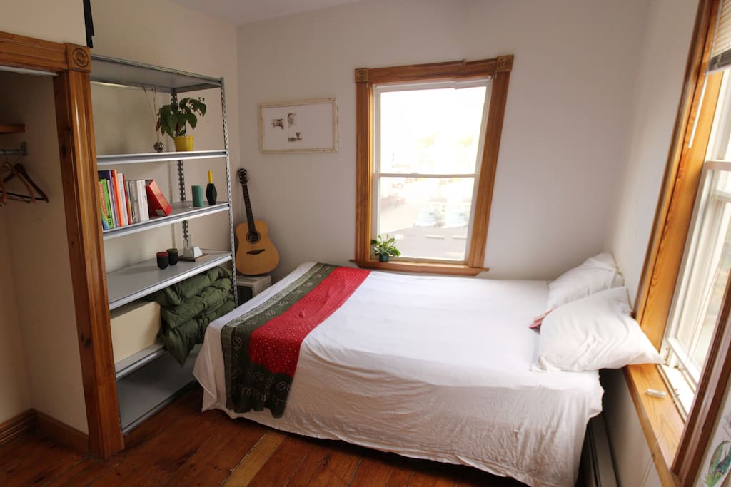 Real Queen Sized bed with two big windows, you will have plenty of storage room and a closet with hangers. Rooms decorated with Yili's watercolor paintings.