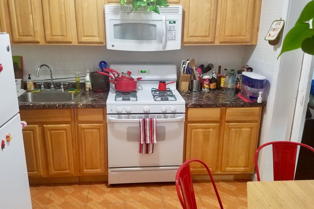 Cheery, fully equipped kitchen packed with snacks, coffee, tea, and everything you need for your overnight oats.