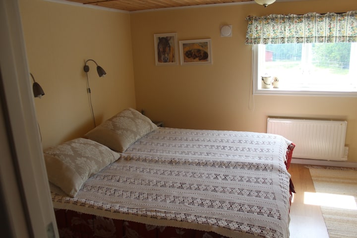Bedroom 1 with a double bed and room for a baby bed (available to borrow).