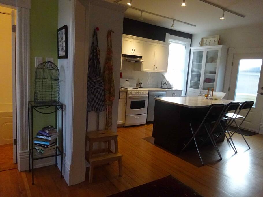 Open floor plan and door to outside balcony