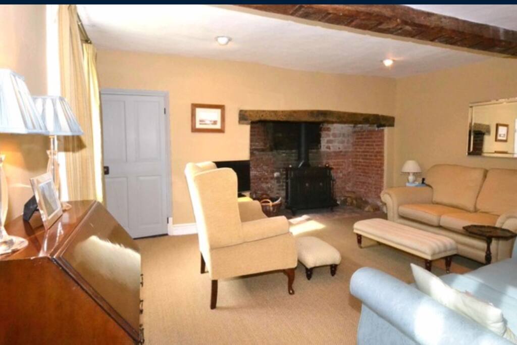 Drawing room with inglenook and wood burner