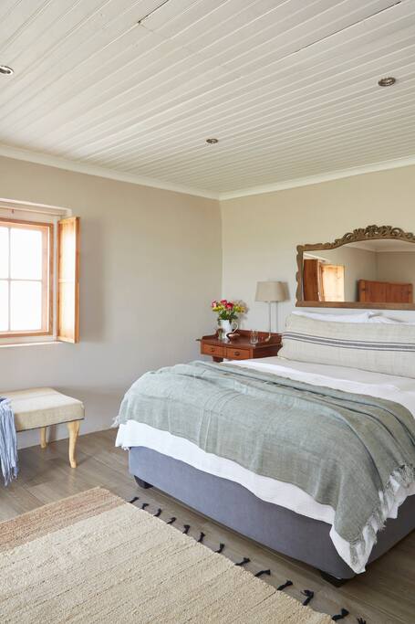 Cottage 3 - Main bedroom with queen size bed and ensuite bathroom.