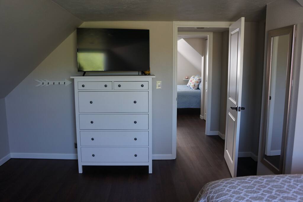 Two bedrooms located upstairs with a bathroom between them