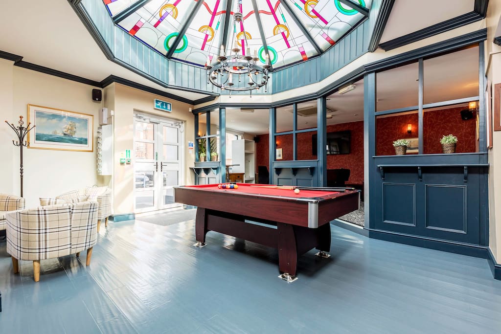 Lobby and pool table - games room. Table football, Air Hockey and Retro arcade games. Spotify / Sky T.V on large screen T.V / google / Siri and Alexa