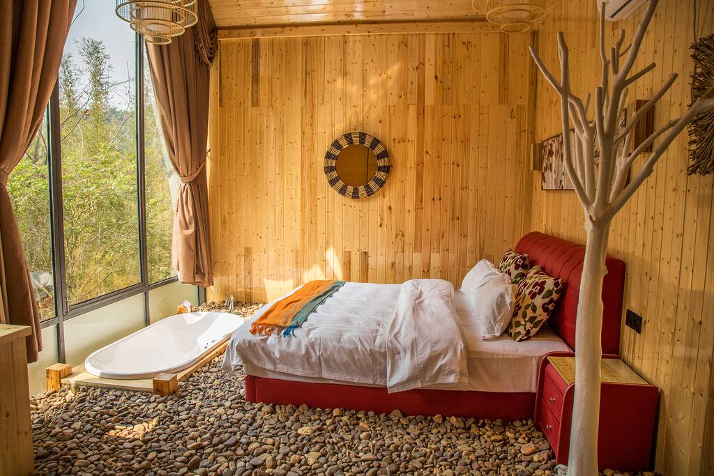 King size bed with sunken bathtub